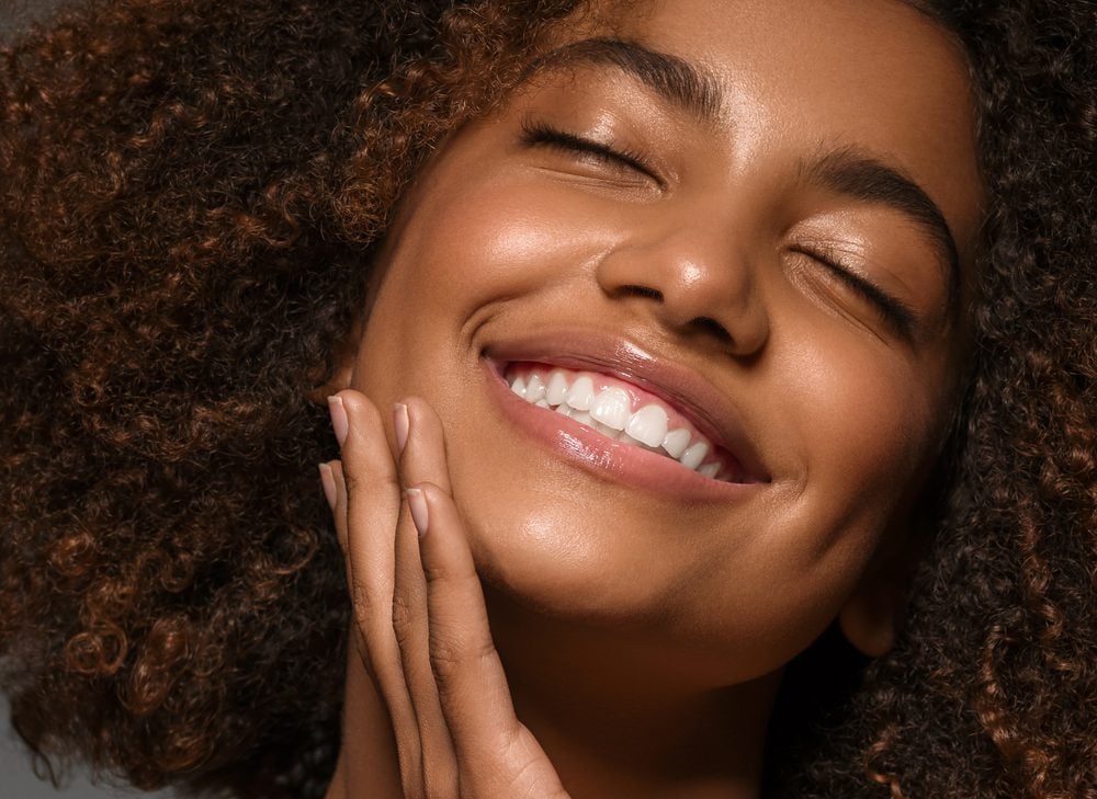 Beautiful,African,American,Woman,Face,Close,Up,Teeth,Smile,Happy